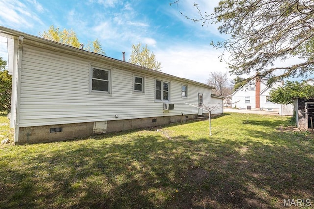 406 Locust St, Richland, MO 65556 - rear view of house with crawl space and a lawn