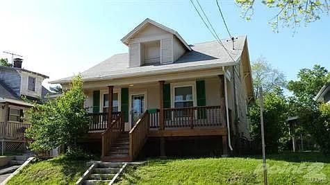 2608 Walnut St, Alton, IL 62002 - view of front of home with a porch and a front lawn