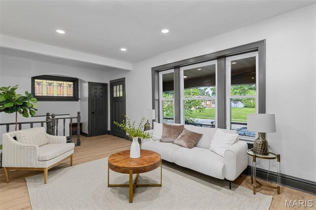 6007 S Kingshighway Blvd S, Saint Louis, MO 63109 - living area featuring wood finished floors, recessed lighting, and baseboards