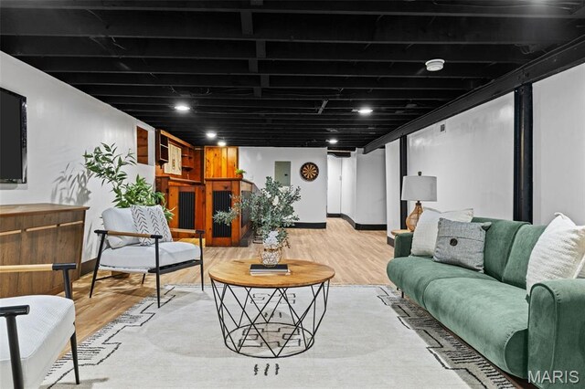 6007 S Kingshighway Blvd S, Saint Louis, MO 63109 - living room featuring wood finished floors and baseboards