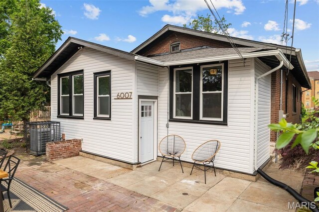 6007 S Kingshighway Blvd S, Saint Louis, MO 63109 - back of house featuring a patio area