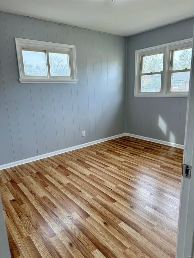 4400 Mohegan Dr, Saint Louis, MO 63123 - spare room with wood finished floors and baseboards