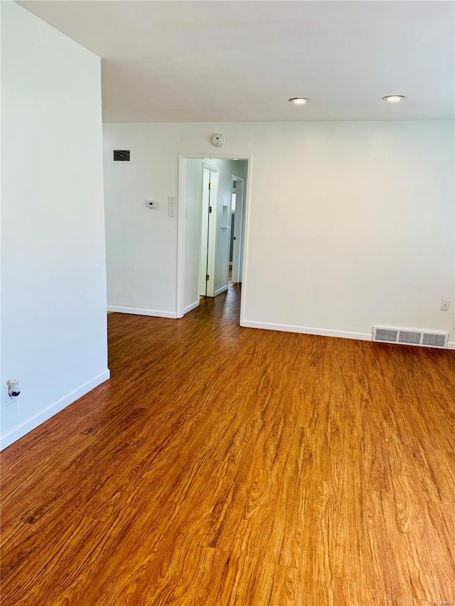 4400 Mohegan Dr, Saint Louis, MO 63123 - spare room with baseboards and wood finished floors