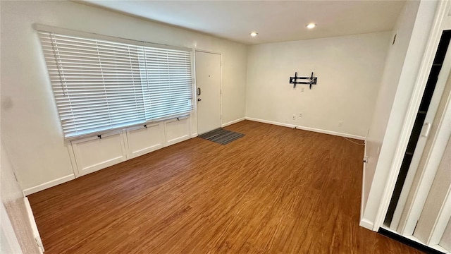 4400 Mohegan Dr, Saint Louis, MO 63123 - spare room with wood finished floors and recessed lighting