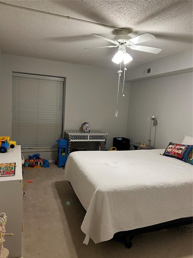 572 Coeur De Royale Unit 103, Creve Coeur, MO 63141 - bedroom featuring carpet floors and a ceiling fan