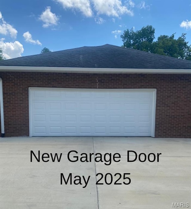 705 Linder Blvd, Greenville, IL 62246 - garage featuring concrete driveway