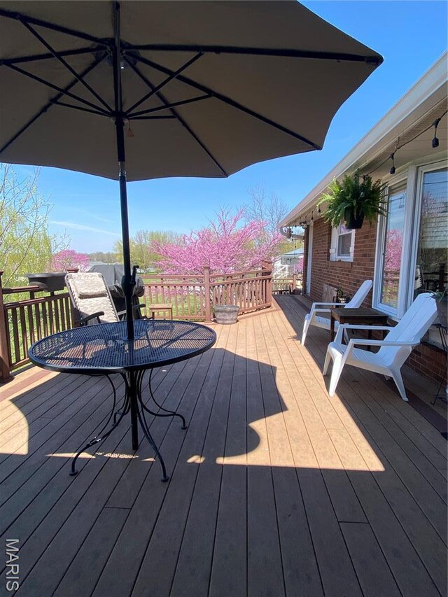 705 Linder Blvd, Greenville, IL 62246 - wooden deck featuring outdoor dining area