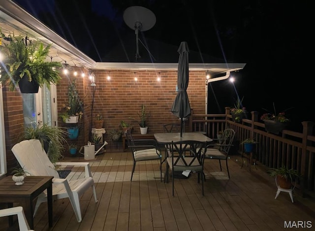 705 Linder Blvd, Greenville, IL 62246 - deck at night featuring outdoor dining space