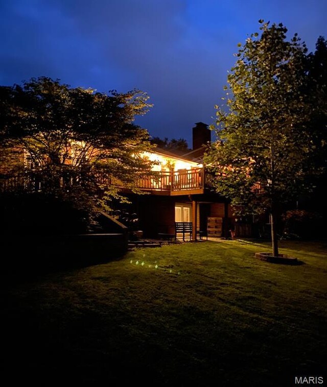 705 Linder Blvd, Greenville, IL 62246 - back of property featuring a wooden deck, a chimney, and a yard