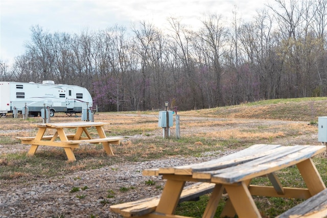 view of yard featuring a wooded view