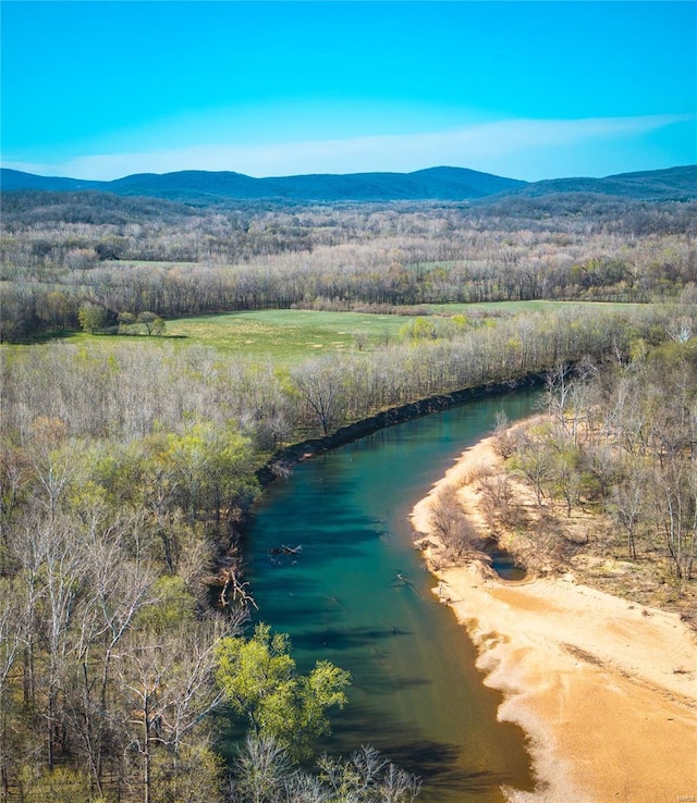 aerial view of mountains and a heavily wooded area