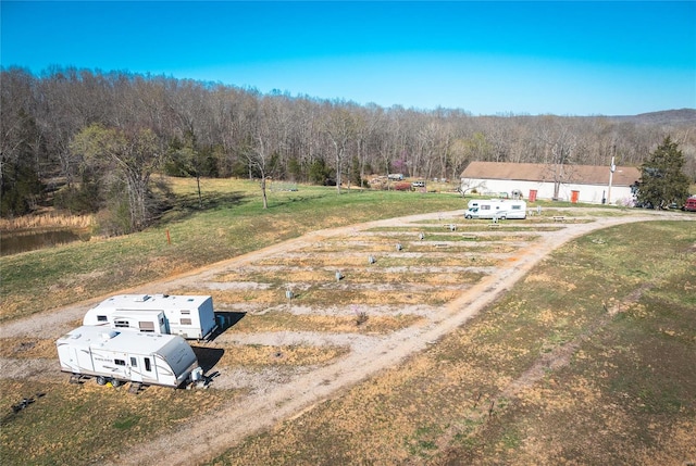 drone / aerial view of a heavily wooded area