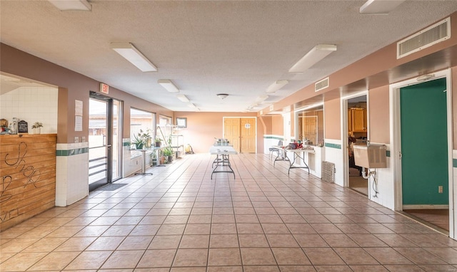 lobby featuring a textured ceiling