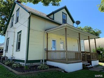 108 Rau St, Waterloo, IL 62298 - back of property with covered porch and a yard
