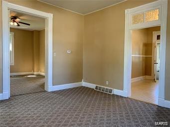 108 Rau St, Waterloo, IL 62298 - carpeted empty room with baseboards, ceiling fan, and crown molding