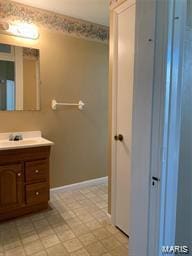 108 Rau St, Waterloo, IL 62298 - bathroom with vanity, baseboards, and tile patterned floors