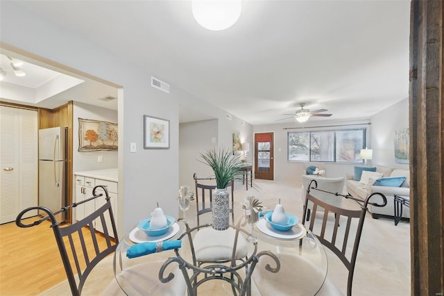 dining area featuring a ceiling fan