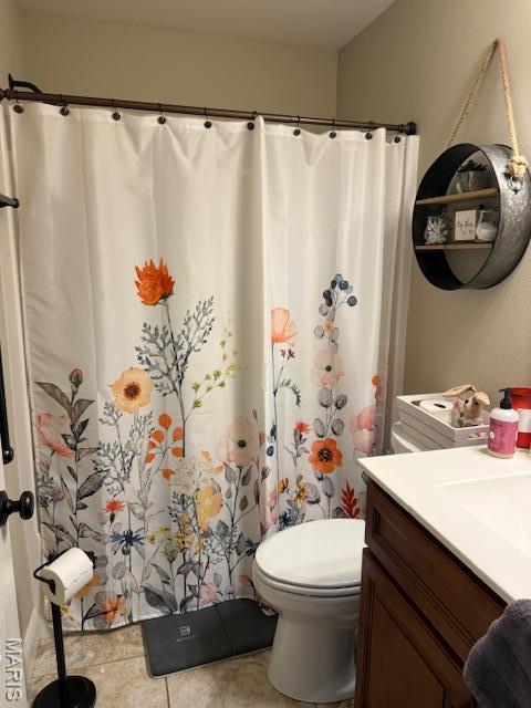 1607 Enterprise Ct, Jackson, MO 63755 - full bath with toilet, tile patterned floors, vanity, and curtained shower