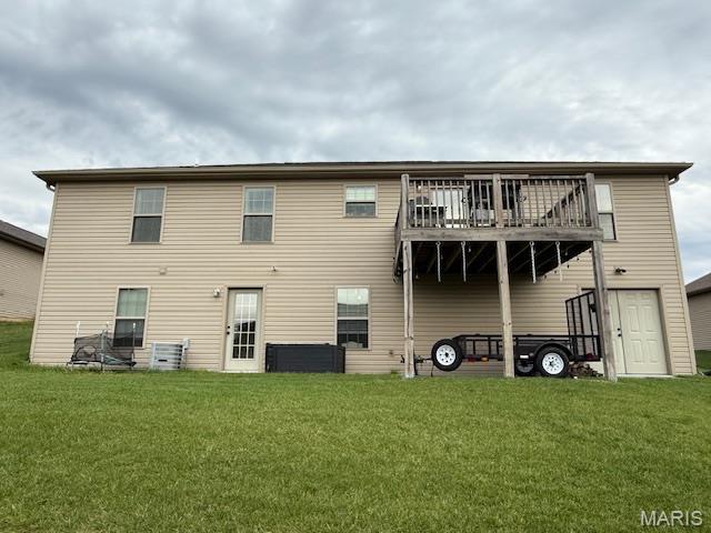 1607 Enterprise Ct, Jackson, MO 63755 - rear view of property with a yard