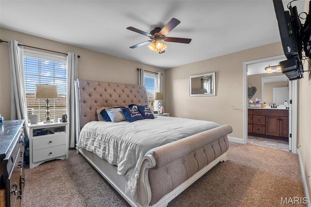 1607 Enterprise Ct, Jackson, MO 63755 - bedroom featuring light carpet, ensuite bathroom, ceiling fan, and baseboards