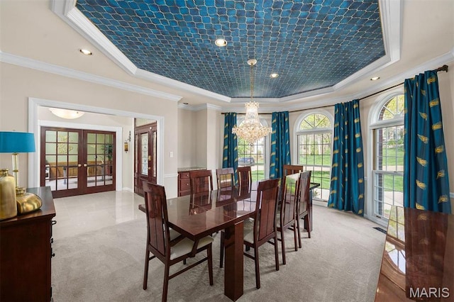 1416 Haarman Oak Dr, Wildwood, MO 63005 - dining room with a tray ceiling, a chandelier, french doors, crown molding, and carpet floors