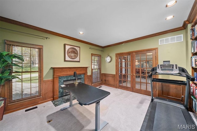 1416 Haarman Oak Dr, Wildwood, MO 63005 - home office with a wainscoted wall, a high end fireplace, french doors, carpet flooring, and healthy amount of natural light