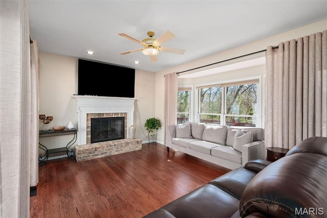 1416 Haarman Oak Dr, Wildwood, MO 63005 - living area with ceiling fan, a fireplace, wood finished floors, and recessed lighting