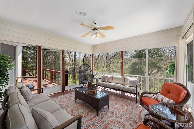 1416 Haarman Oak Dr, Wildwood, MO 63005 - sunroom with an outdoor living space, ceiling fan, and wood finished floors