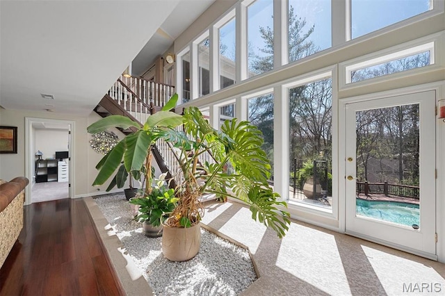 1416 Haarman Oak Dr, Wildwood, MO 63005 - unfurnished sunroom featuring wood finished floors and plenty of natural light