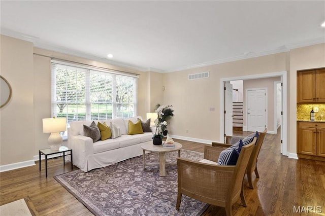living room with crown molding, dark wood finished floors, stairs, baseboards, and recessed lighting