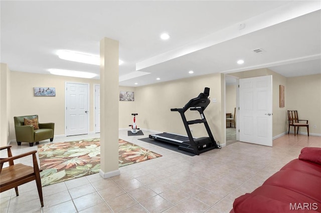 exercise room with light tile patterned floors, recessed lighting, and baseboards