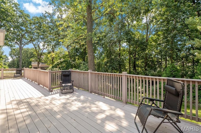 deck with view of scattered trees