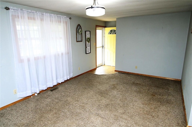 634 Ccam Rose Ln, Perryville, MO 63775 - spare room featuring light carpet and baseboards