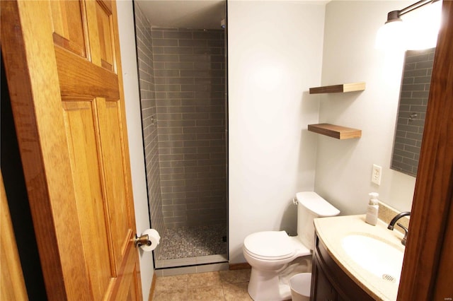 634 Ccam Rose Ln, Perryville, MO 63775 - bathroom with a stall shower, vanity, toilet, and tile patterned floors