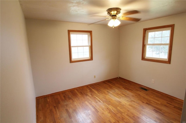 634 Ccam Rose Ln, Perryville, MO 63775 - spare room with light wood-style flooring, ceiling fan, and baseboards