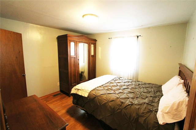 634 Ccam Rose Ln, Perryville, MO 63775 - bedroom featuring wood finished floors and baseboards