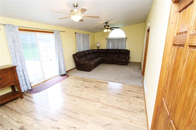 634 Ccam Rose Ln, Perryville, MO 63775 - living area with a ceiling fan, wood finished floors, and baseboards