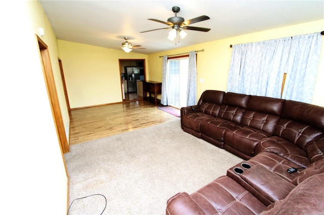 634 Ccam Rose Ln, Perryville, MO 63775 - carpeted living room featuring ceiling fan, baseboards, and wood finished floors