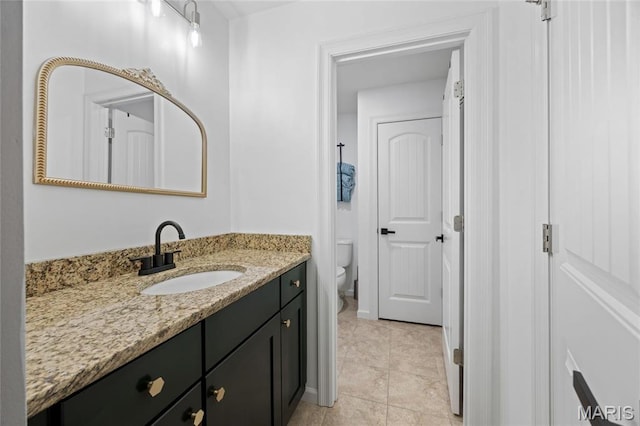 351 Oak Stand Ct, Chesterfield, MO 63005 - bathroom featuring vanity, toilet, and tile patterned floors