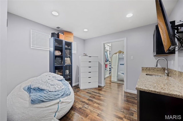 351 Oak Stand Ct, Chesterfield, MO 63005 - living area featuring dark wood finished floors, recessed lighting, and baseboards