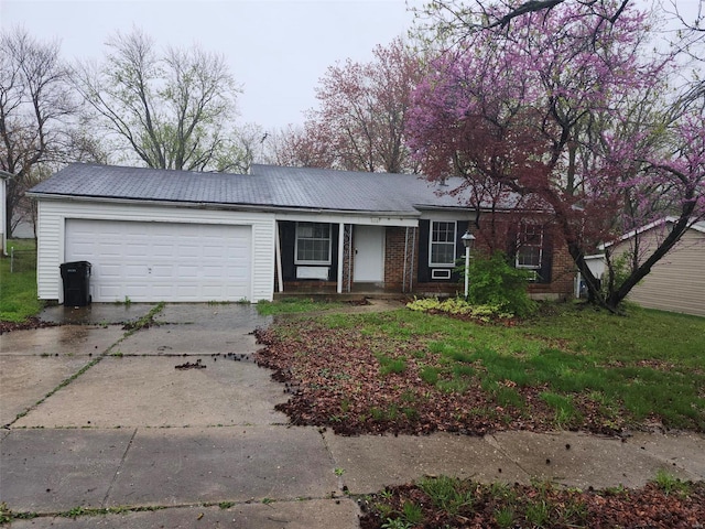 6081 Silver Fox Dr, Florissant, MO 63034 - single story home with concrete driveway, an attached garage, and brick siding