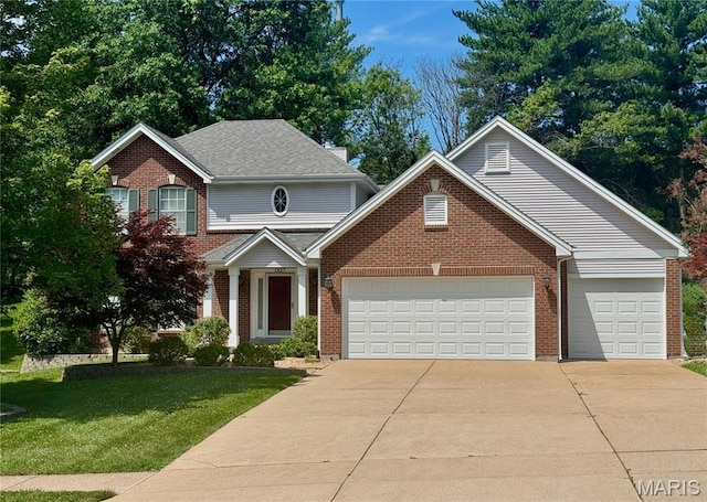 1827 Pheasant Run Dr, Maryland Heights, MO 63043 - traditional-style home with driveway, an attached garage, a front lawn, and brick siding