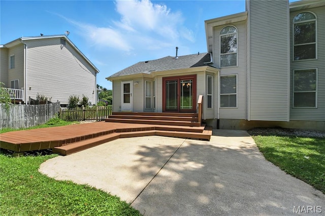 1827 Pheasant Run Dr, Maryland Heights, MO 63043 - back of house with a wooden deck and a patio area