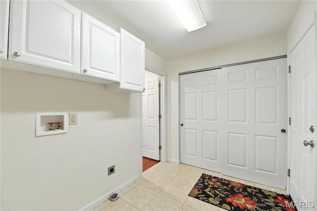1827 Pheasant Run Dr, Maryland Heights, MO 63043 - washroom with cabinet space, hookup for an electric dryer, hookup for a washing machine, and light tile patterned flooring