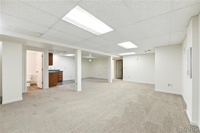 1827 Pheasant Run Dr, Maryland Heights, MO 63043 - finished basement with light carpet and a drop ceiling