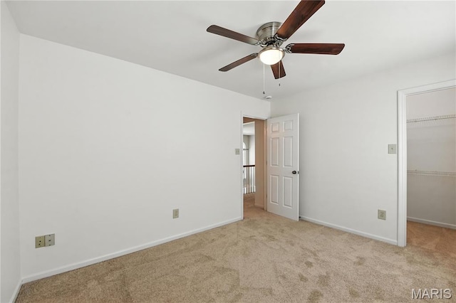 1827 Pheasant Run Dr, Maryland Heights, MO 63043 - unfurnished bedroom featuring a spacious closet, carpet flooring, and ceiling fan