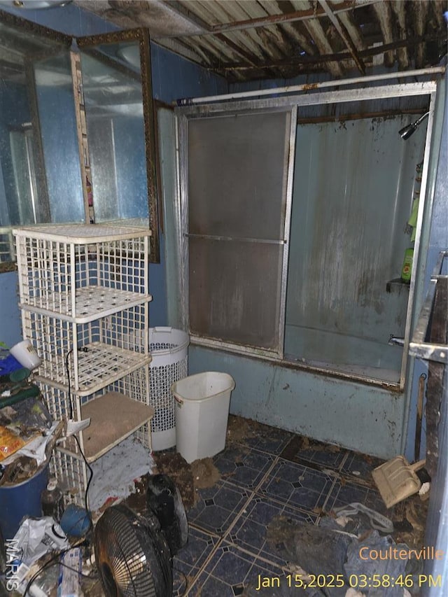 206 N 11th St, Coulterville, IL 62237 - full bath with shower / bath combination with glass door and stone finish flooring