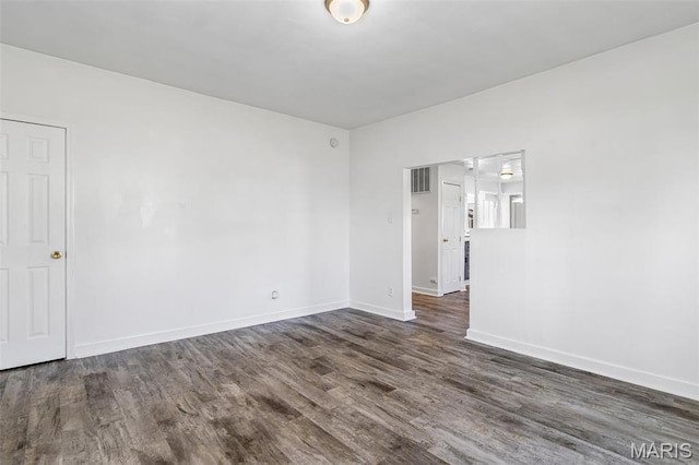 209 N Washington St, Desloge, MO 63601 - empty room featuring wood finished floors and baseboards