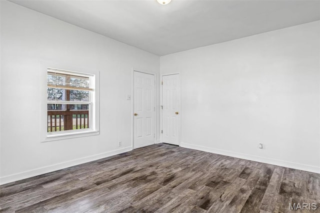 209 N Washington St, Desloge, MO 63601 - spare room featuring wood finished floors and baseboards
