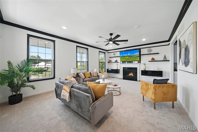 713 Alban Aly, Ofallon, MO 63368 - carpeted living area featuring ornamental molding, baseboards, ceiling fan, recessed lighting, and a fireplace with flush hearth